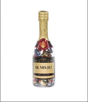 Champagnefles - Ik mis je - Gevuld met een Valentijnsmix - In cadeauverpakking met gekleurd lint