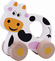 Houten koe op wielen grip