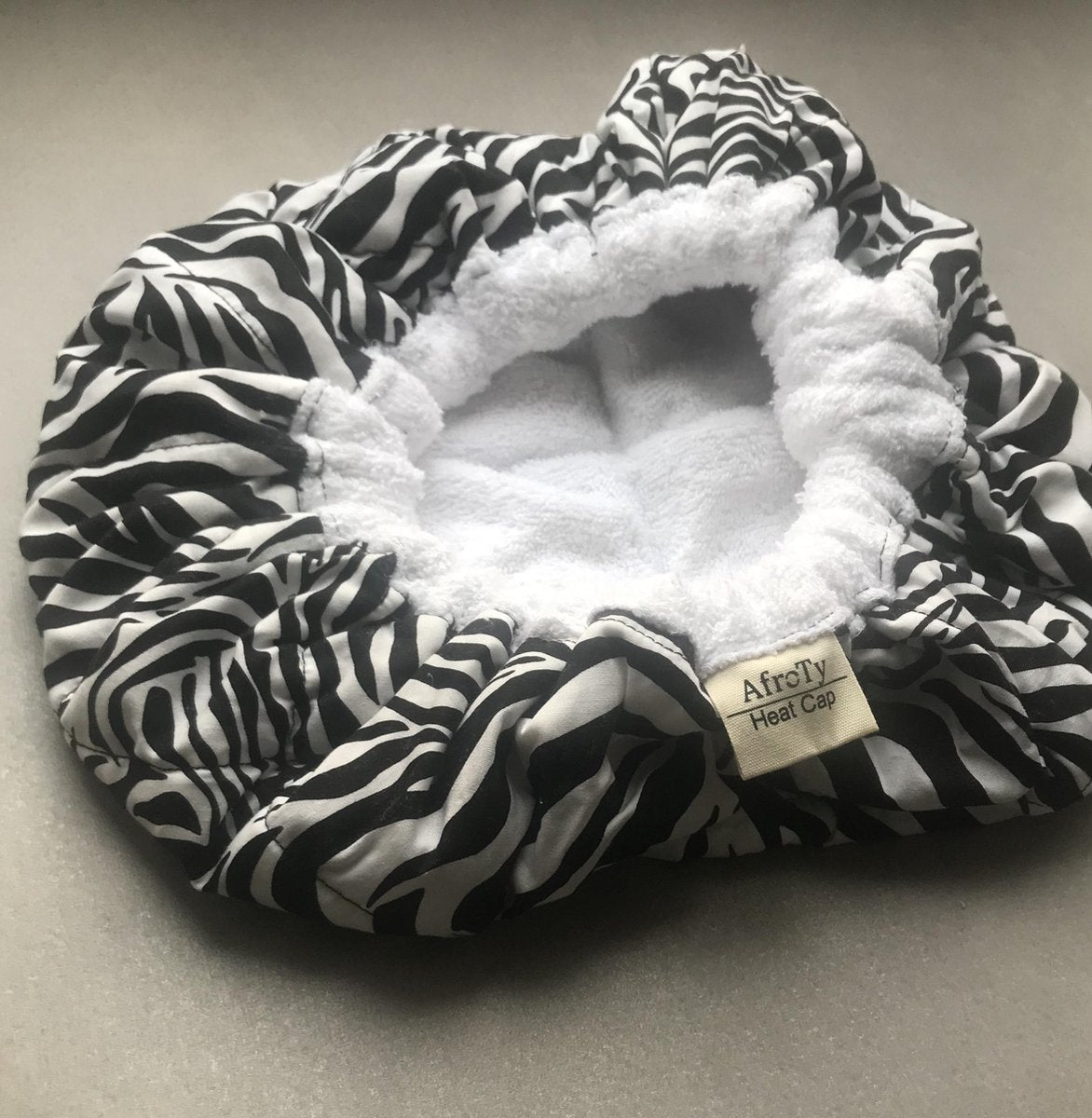 Heatcap van AfroTy zebra wit