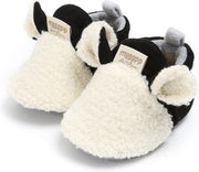 Schattige en warme Myggpp baby slofjes met anti slip zool zwart/wit 6-12 mnd/12 cm