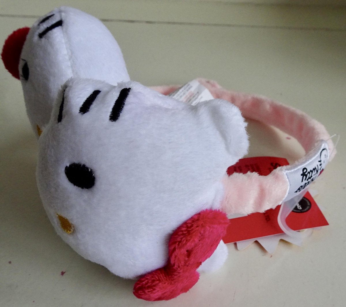 Oorwarmers van Hello Kitty lichtroze oortjes