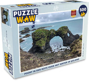 Puzzel - 500 stukjes - Poort in een rots over het water in IJsland