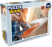 Puzzel Kunst 1000 stukjes - Close-up van een schilder met penseel en palet