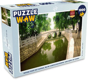 Puzzel 1000 stukjes volwassenen Confuciustempel van Qūfù 1000 stukjes - Brugje over het kanaal bij de Confuciustempel van Qūfù in China PuzzleWow heeft +100000 puzzels