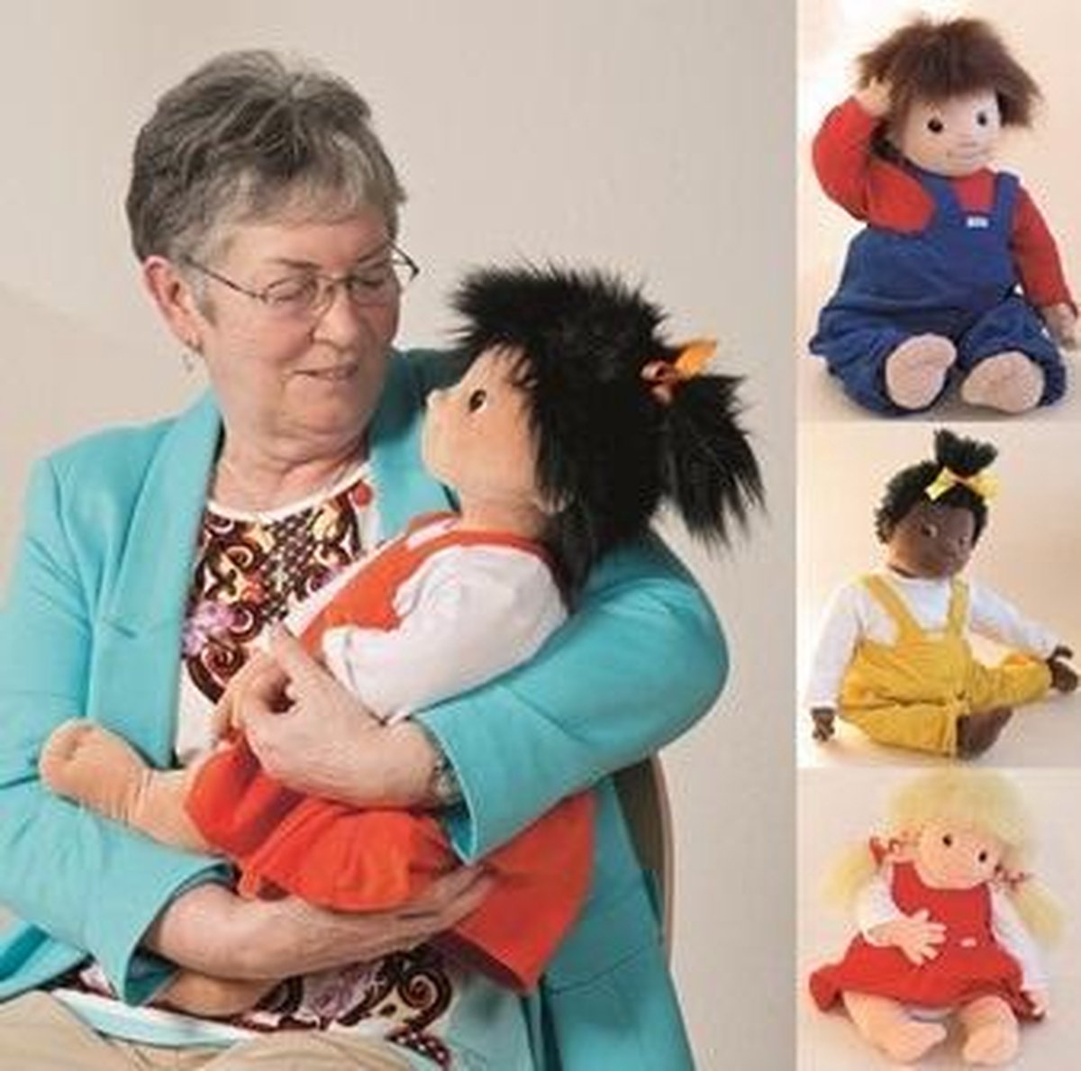 Empathiepop Joyk 65 cm Emilie (oranje kleedje)