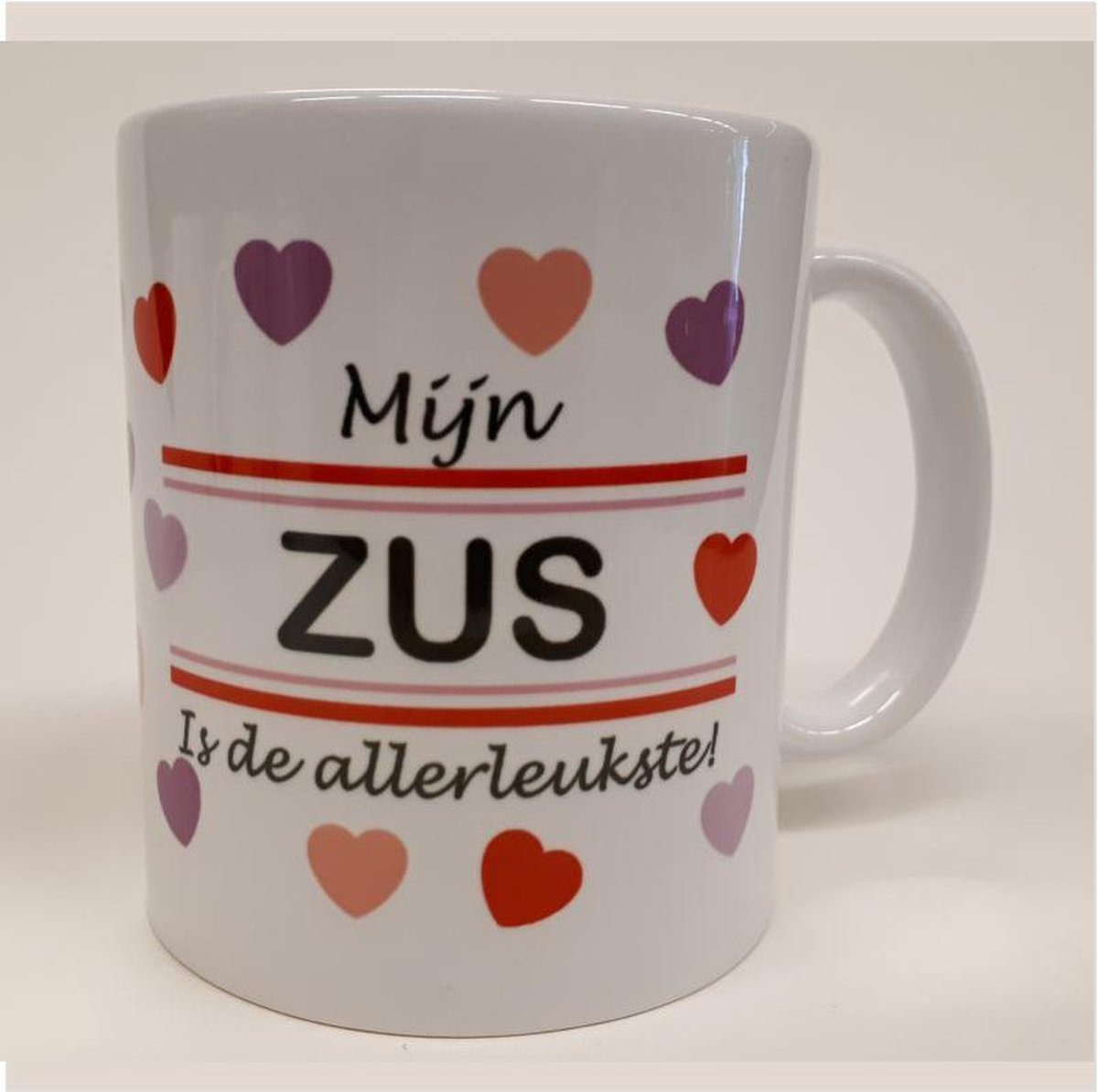 Witte mok met hartjes Mijn zus is de allerliefste