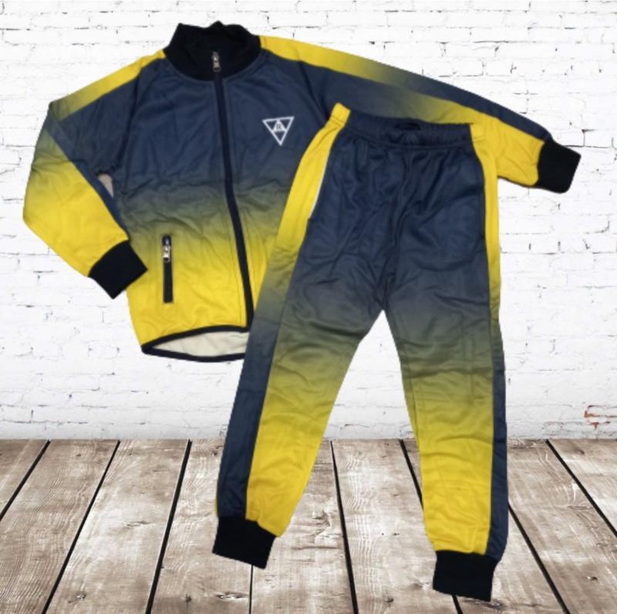 S&C Trainingspak Geel blauw F-212 - 134/140