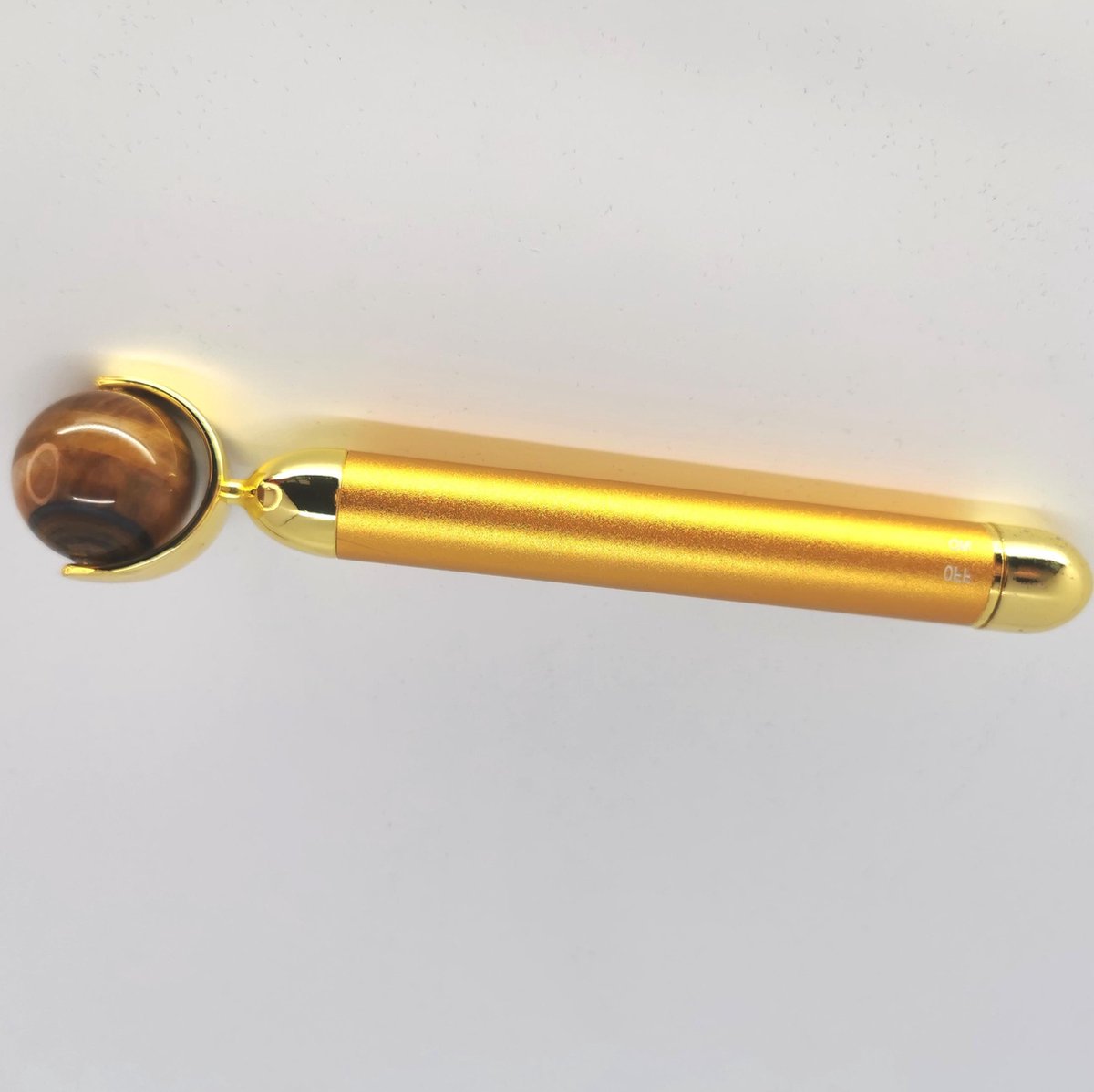 Vibrerende Jade massage roller met echte Tijgeroog edelsteen voor de fijne lijntjes rondom je ogen en mondhoekje