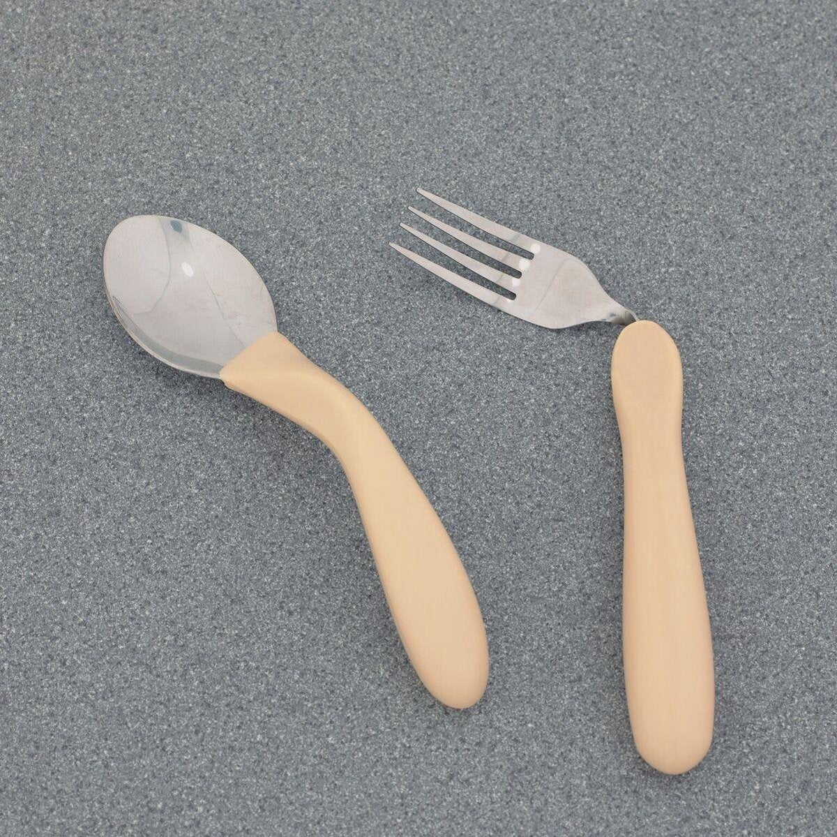 Gebogen bestek Caring lepel links gebogen