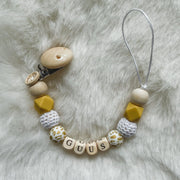 Babybeads - Speenkoord met naam - Okergeel met gouden tijgerprint