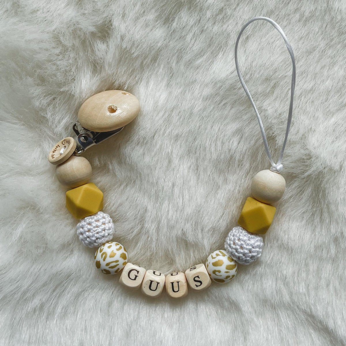 Babybeads - Speenkoord met naam - Okergeel met gouden tijgerprint
