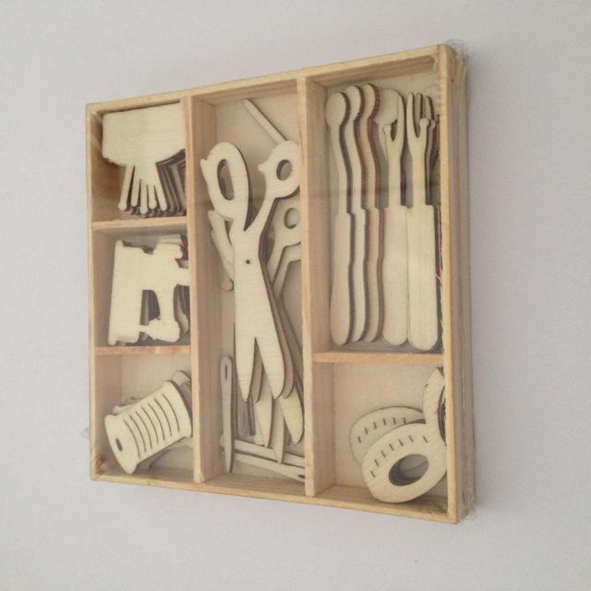 Houten ornament naaigerei