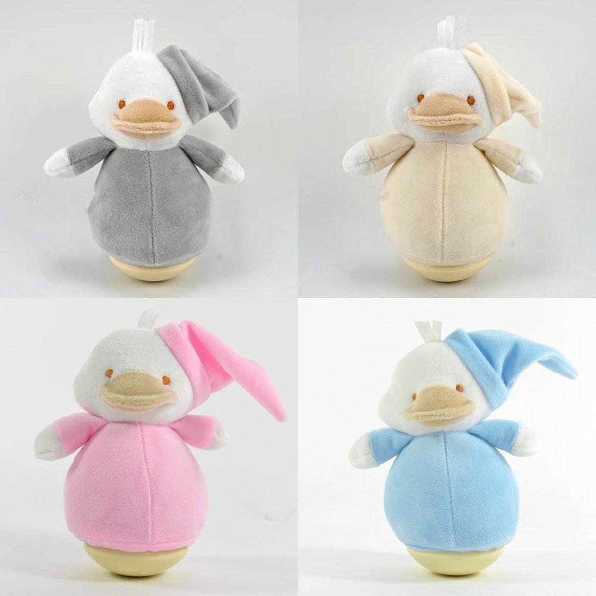 baby knuffel- tuimelaar- wiggle figuur - eend - beige