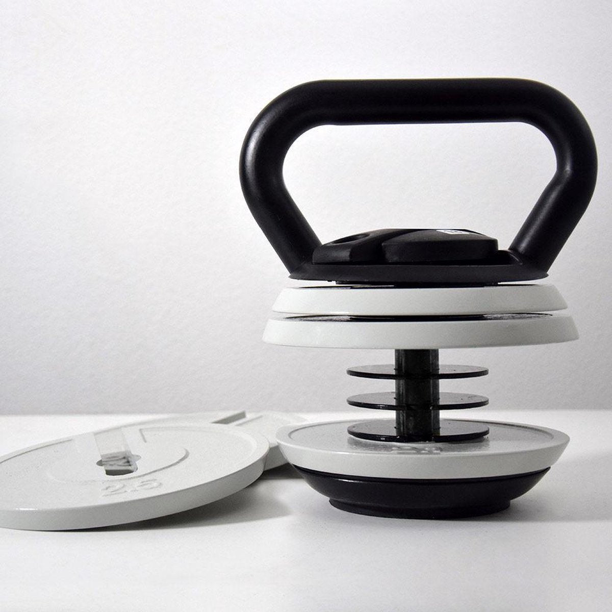 Verstelbare Kettlebell - 22 Kettlebels in 1 - van 3.5 t/m 18 kilo - Incl. 6 schijven - Thuis Sporten - Incl. Workouts