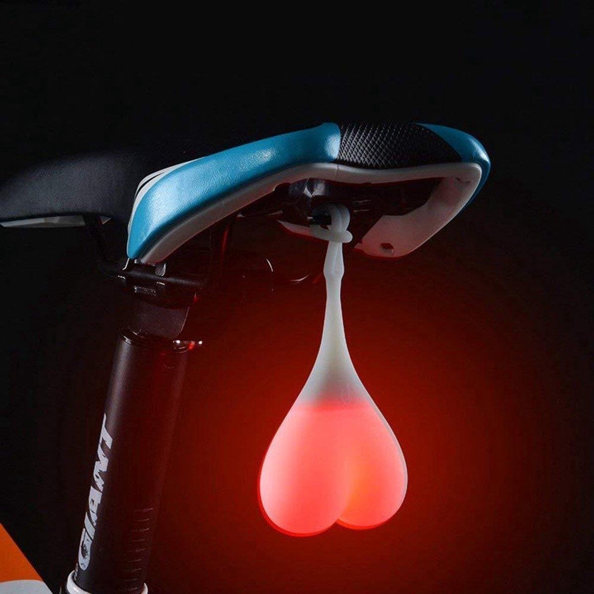LOUZIR Opvallend waterproof fiets led achterlicht in de vorm van een slingerende balzak(met rode