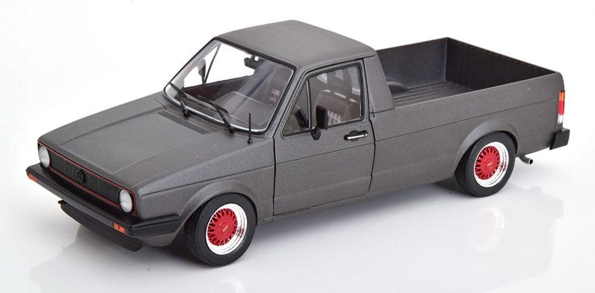 Volkswagen Caddy MK I "Custom" Matgrijs ( rode Velgen ) 1-18 Solido