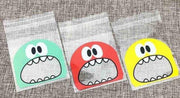 100x transparante uitdeelzakjes monster geel (10x7 cm)