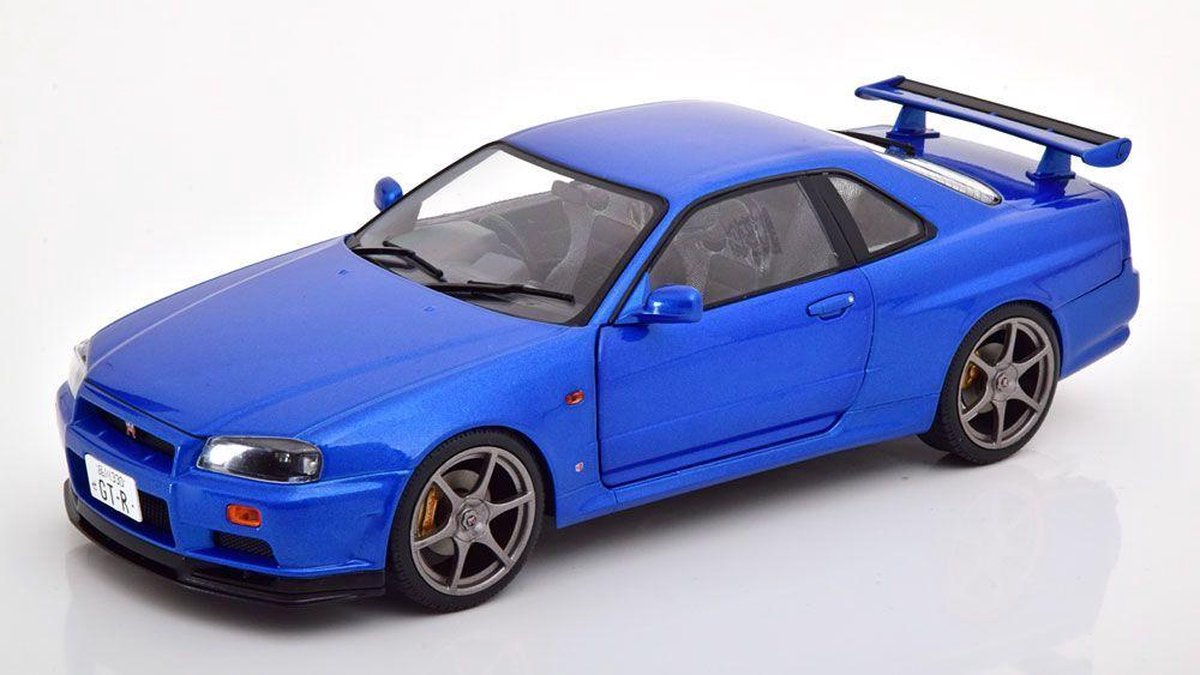 Nissan Skyline GT-R (R34) 1999 - 1:18 - Solido