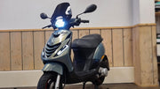 PLAATSET ZIP SP PASSEND OP PIAGGIO ZIP 5 DELIG BLUE/GREY (CAMELEON/PARELMOER EFFECT)