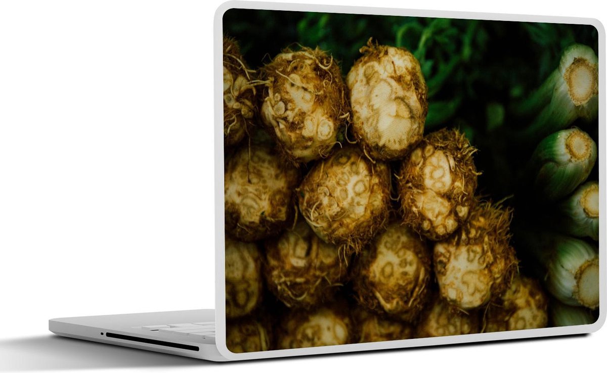 Laptop sticker - 10.1 inch - Aantal knolselderijen met een donkere achtergrond