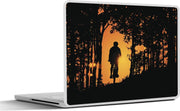 Laptop sticker - 10.1 inch - Illustratie van een silhouet van een man op een mountainbike met een zonsondergang
