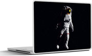 Laptop sticker - 10.1 inch -  een ruimtereiziger op een zwarte achtergrond