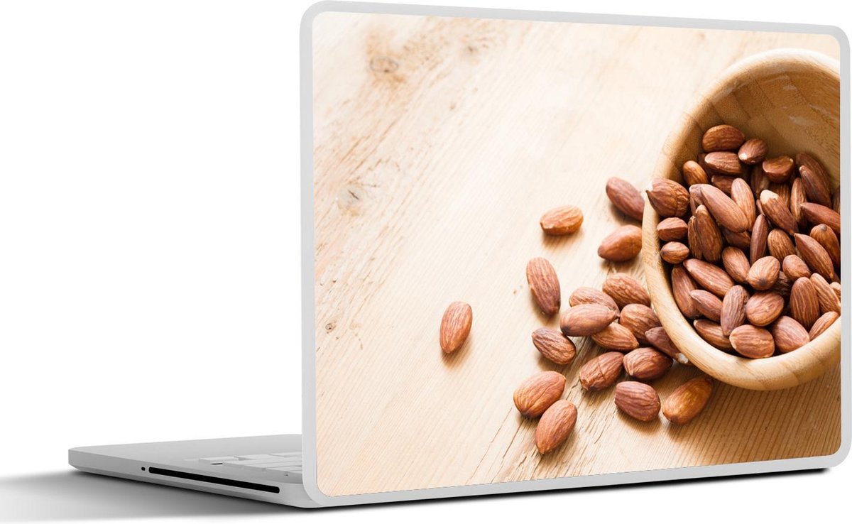 Laptop sticker - 10.1 inch - Amandelen in houten kom op een houten tafel