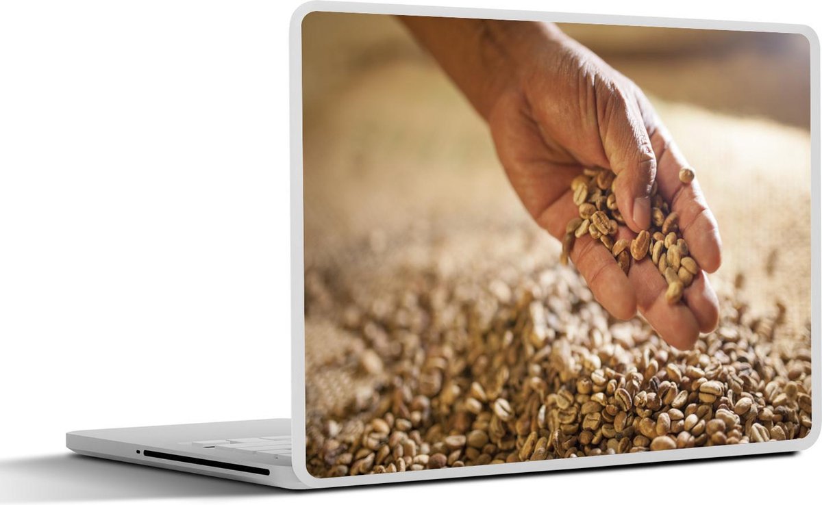 Laptop sticker - 10.1 inch - Afbeelding van een man die de oogst van een granenveld beetpakt