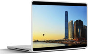 Laptop sticker - 10.1 inch - International Commerce Centre aan het water bij een zonsondergang