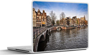 Laptop sticker - 10.1 inch - Afbeelding van de Amerikaanse Keizersgracht onder een blauwe lucht met wolken