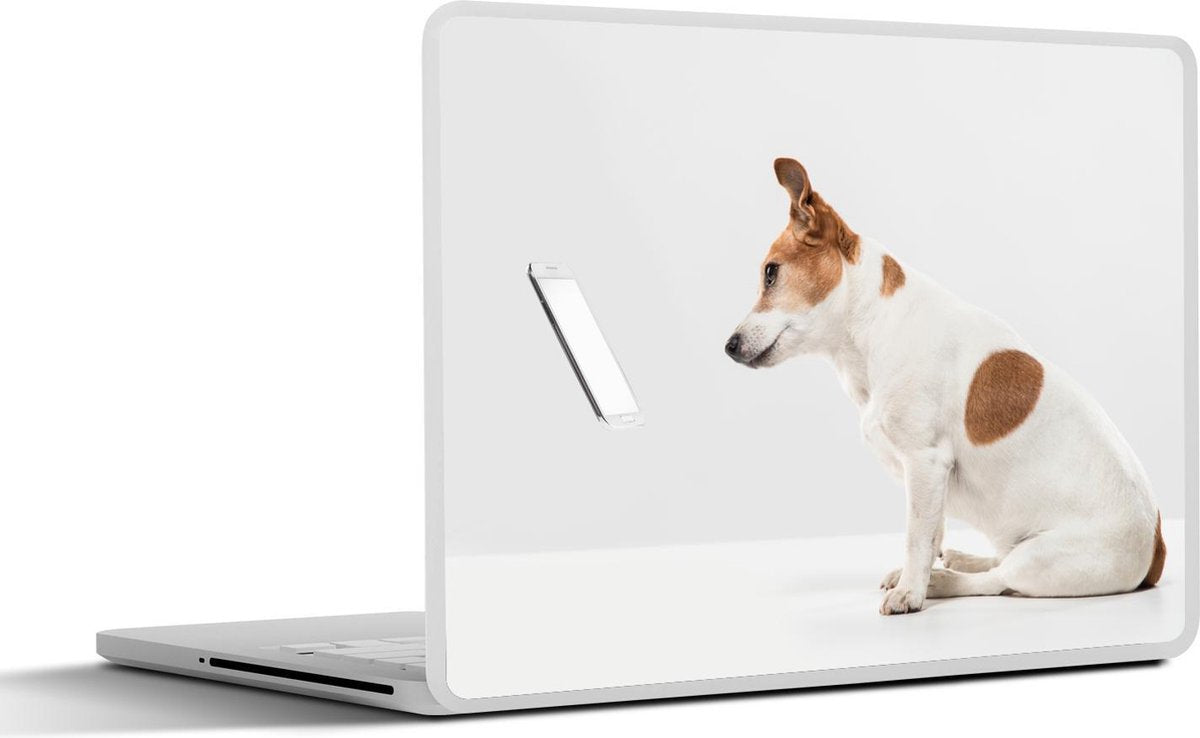 Laptop sticker - 10.1 inch - Jack Russel kijkend naar een zwevende telefoon