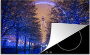 Luxe inductie beschermer London Eye - 80x52 cm - gekleurde London Eye tussen bomen in Londen  - inductiebeschermer