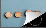 Luxe inductie beschermer Zoethoutwortel - 80x52 cm - Goudbruine schijven van zoethoutwortel  - inductiebeschermer