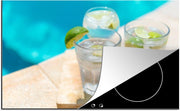 Luxe inductie beschermer Gin tonic - 80x52 cm - Kleurrijk en levendig beeld van twee koude Gin Tonic's  - inductiebeschermer