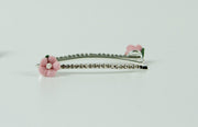 Schuifspelden strass met roze bloem