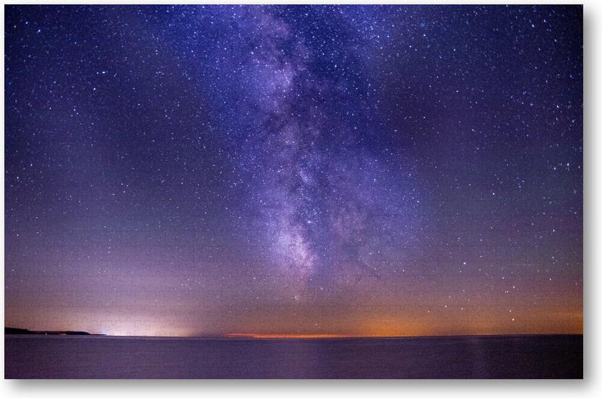 Adembenemende foto van de zee onder een donker paarse sterrenhemel - 1000 Stukjes puzzel voor volwassenen - Besteposter - Sterren