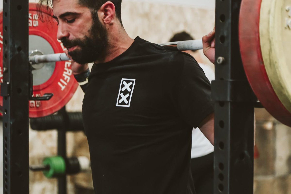 Exxtrawod Kettlebell Logo Unisex T-shirt Crossfit training tee Maat M
