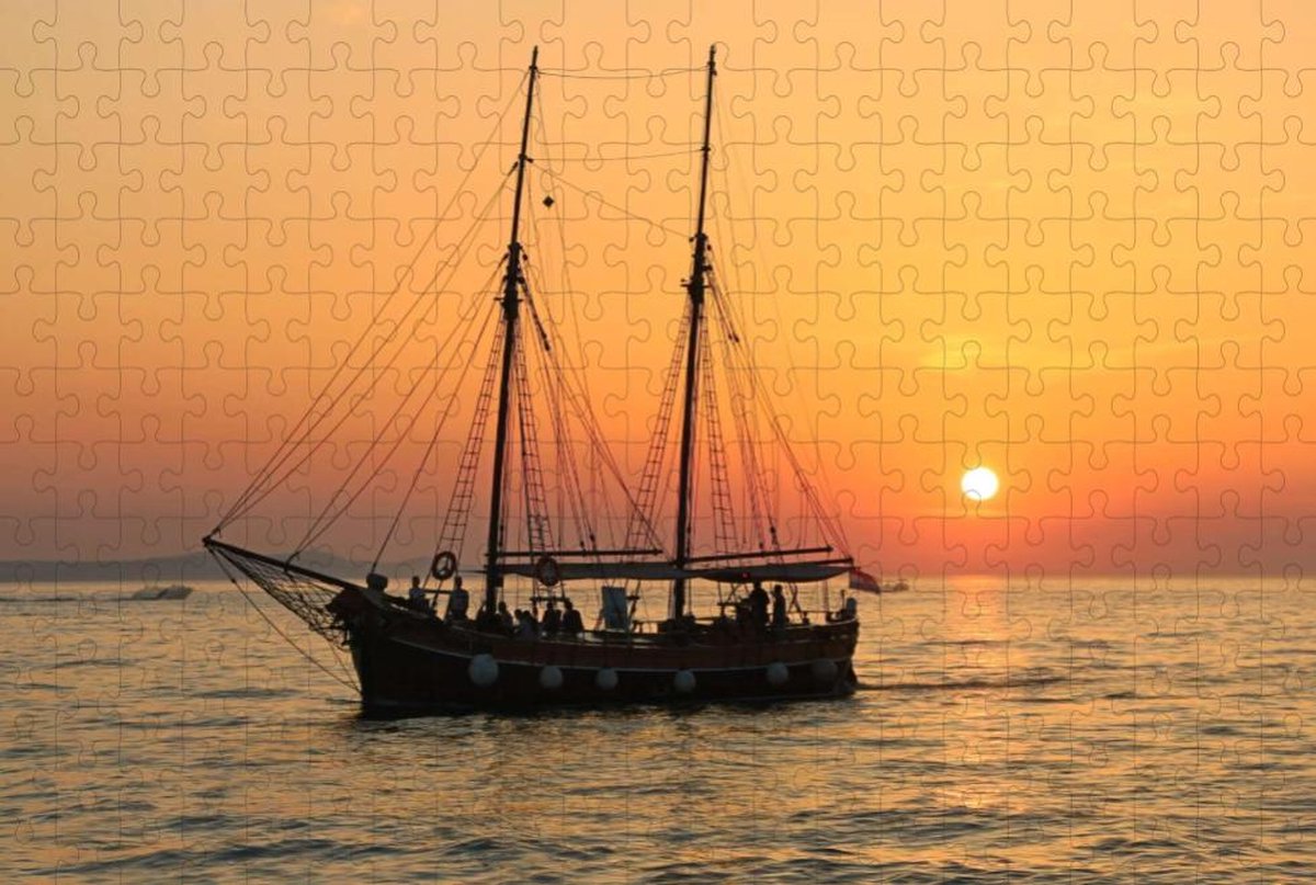 Zeilschip Op Zee Met Ondergaande Zon - Moeilijke Legpuzzel 252 stukjes
