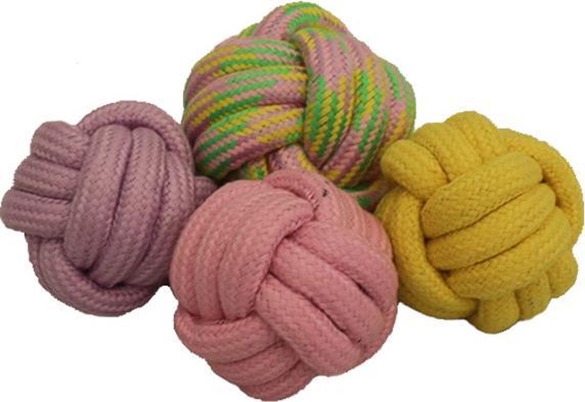 Gekleurde ballen in pastel tinten voor de hond