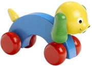 Houten hond op wielen gekleurd