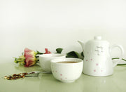 Thee pot en 2x theekom "sparkling looking good tea".