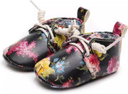 Babyschoentjes zwarte bloemenprint 0-6 maanden