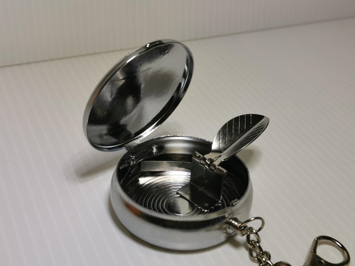 asbakje sleutelhanger voor op straat