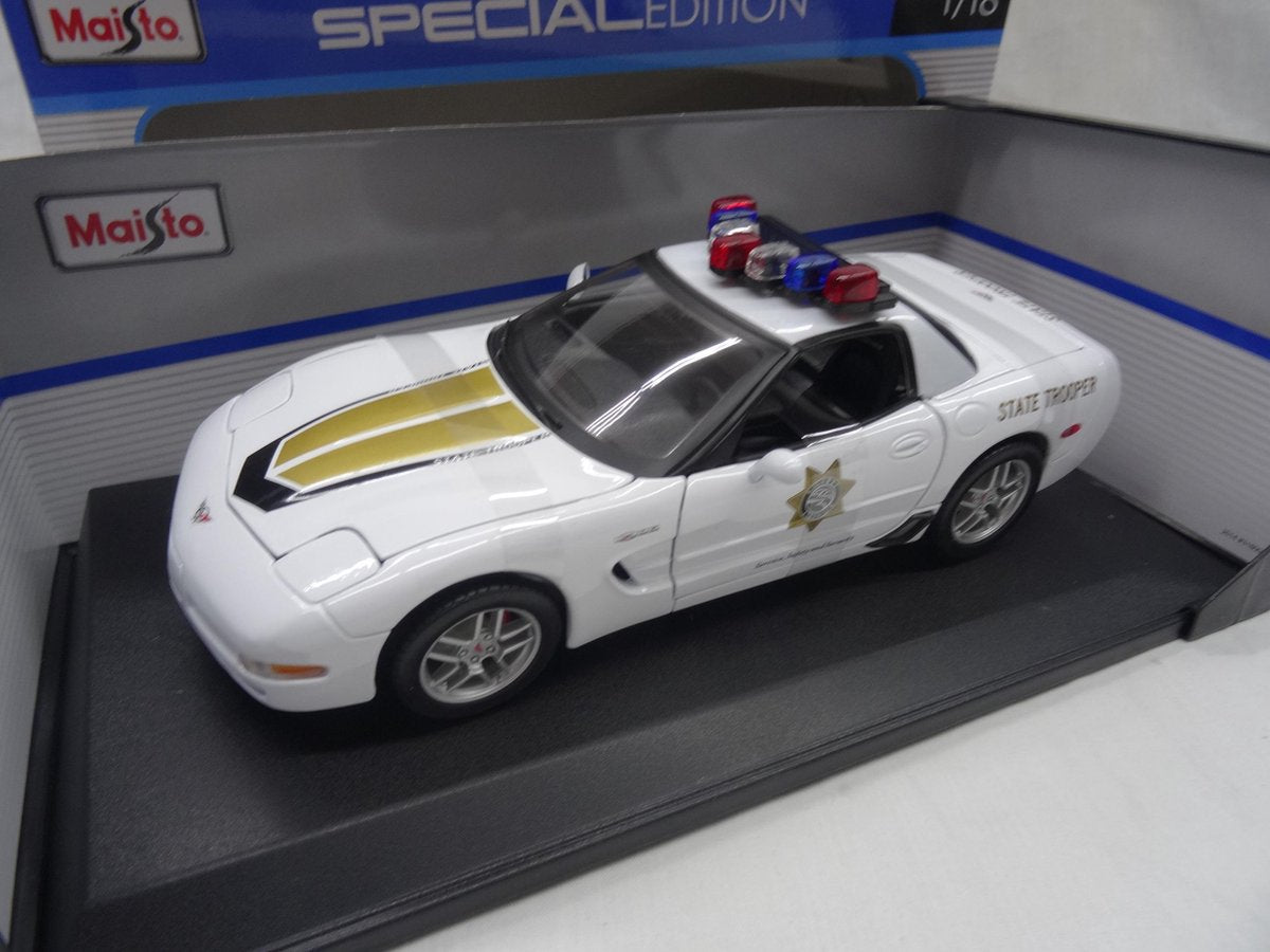 Maisto CHEVROLET CORVETTE Z06 POLICE 2001 Wit/goud/zwart schaalmodel 1:18