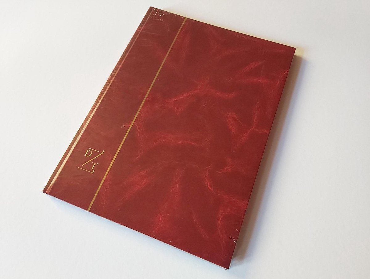 Dezittere postzegelalbum 48 bladzijden rode kaft