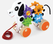 Hond met roterende tandwielen