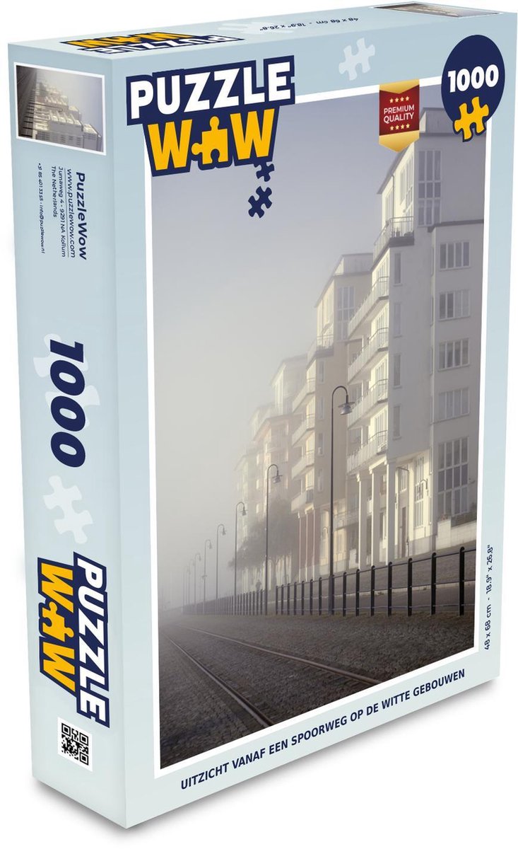 Puzzel 1000 stukjes volwassenen Spoorweg 1000 stukjes - Uitzicht vanaf een spoorweg op de witte gebouwen  - PuzzleWow heeft +100000 puzzels