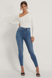 NA-KD Skinny High Waist Raw Hem Vrouwen Jeans - Mid Blue - Maat EU 40