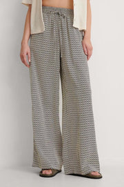 NA-KD Palazzo Vrouwen Broek - Multi Colour Print - Maat EU 40