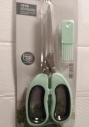 kruidenschaar  limekleur/  metaal/ 5 bladen van roestvrij edelstaal/ met reinigingskam